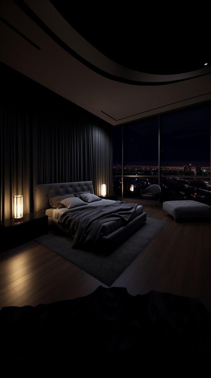 a large bed sitting in the middle of a bedroom next to a night sky view