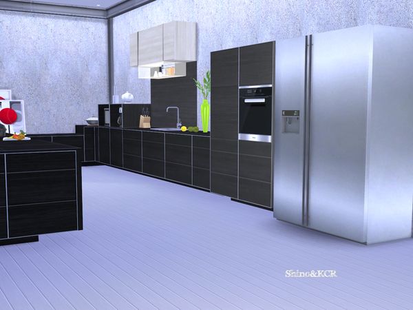 a modern kitchen with black cabinets and stainless steel appliances