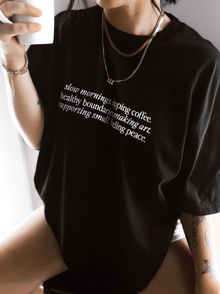 These tees are printed on super soft Comfort Colors, providing a relaxed unisex fit with a worn-in look and feel. This collection offers our most expanded size range from S-3X.Looking for these tees to fit oversized? Size up 1-2 sizes.Model has sized up to an XL for an oversized fit.• 100% ring-spun cotton• Garment-dyed• Relaxed fitThis product is made especially for you as soon as you place an order, please see the banner on the top of our site for current turnaround times. Making products on d Oversize T Shirt, Slogan Tee, Saturday Morning, Oversized Tee, Comfy Tees, Oversized Tshirt, Vintage Looks, Oversized Fits, T Shirt Dress