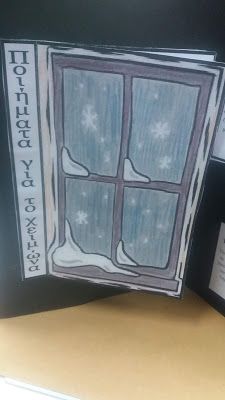 an open book with snowflakes on the window