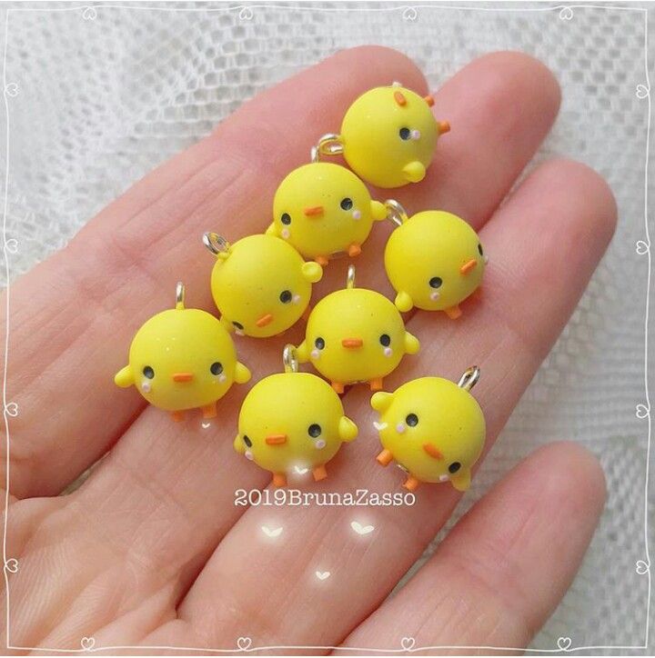 small yellow rubber ducks sitting on top of each other