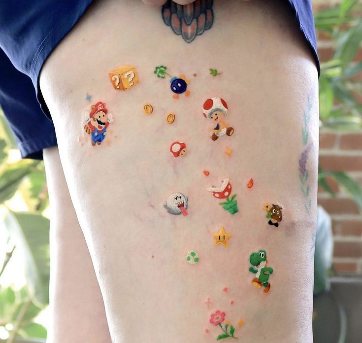 a person with lots of tattoos on their back and legs, all covered in buttons