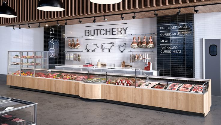 the inside of a butcher shop with lots of food