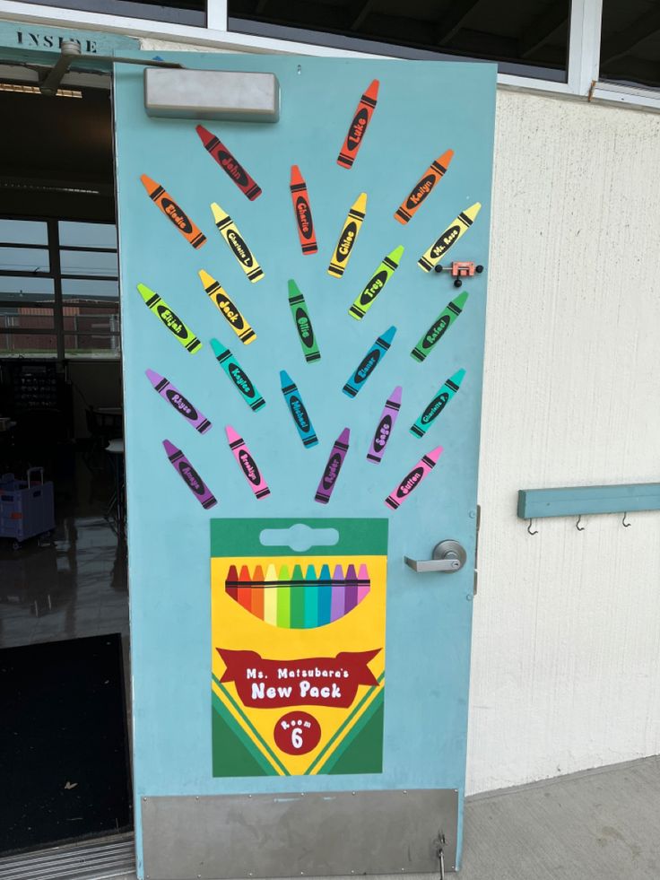 crayon box for back to school. classroom door decoration. First Day Of Preschool Door Ideas, First Grade Decorations Classroom Decor, First Day Of School Door Decorations Preschool, Classroom Door Kindergarten, Back To School Door Decorations Daycare, First Day Of School Door Ideas, Crayon Classroom Door Ideas, Kindergarten Classroom Names Ideas, Crayon Door Decorations Classroom