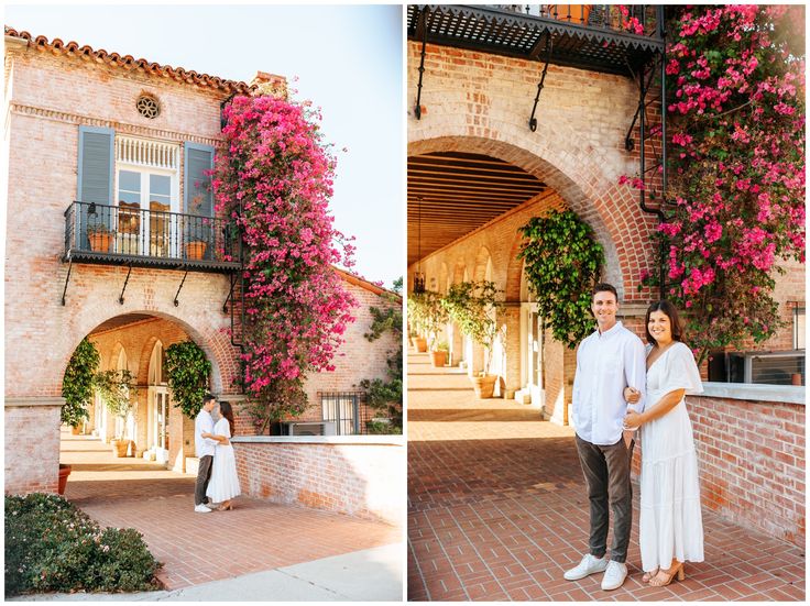 a man and woman standing in front of a building with pink flowers on the walls