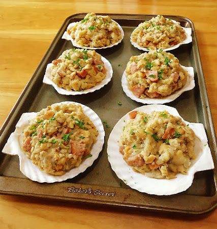 there are six small plates with food on them sitting on a baking tray, ready to be eaten