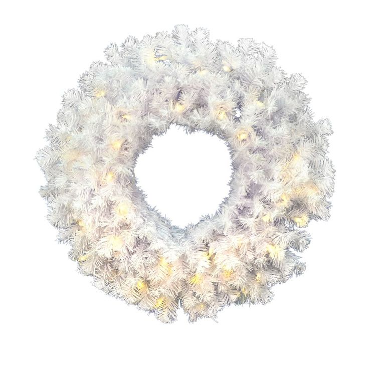 a white wreath with lights on it