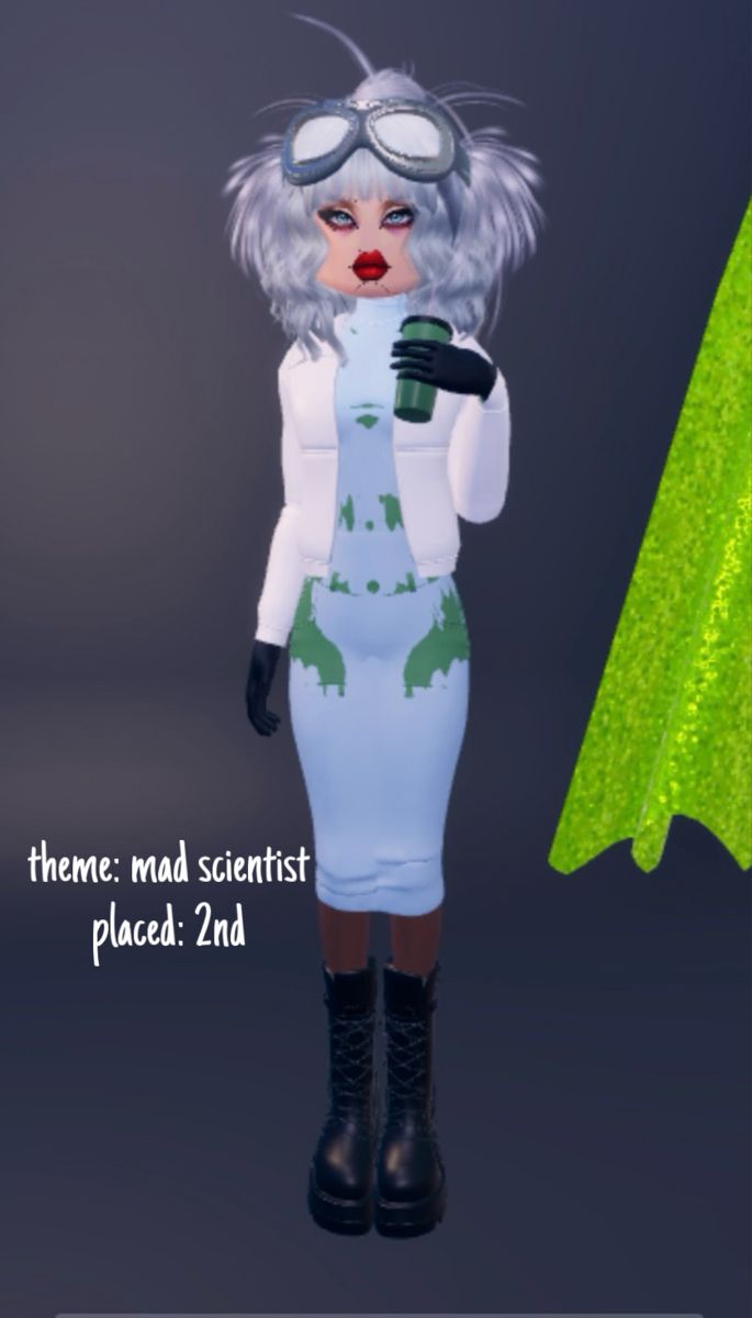 a woman in a dress and goggles standing next to a green object with words on it