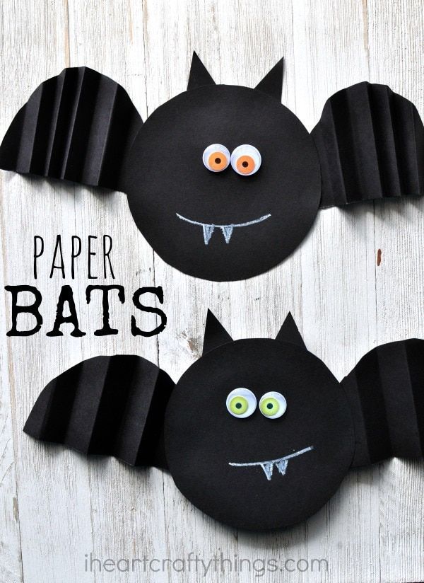 paper bats with eyes and fangs on them are the perfect halloween craft for kids to make