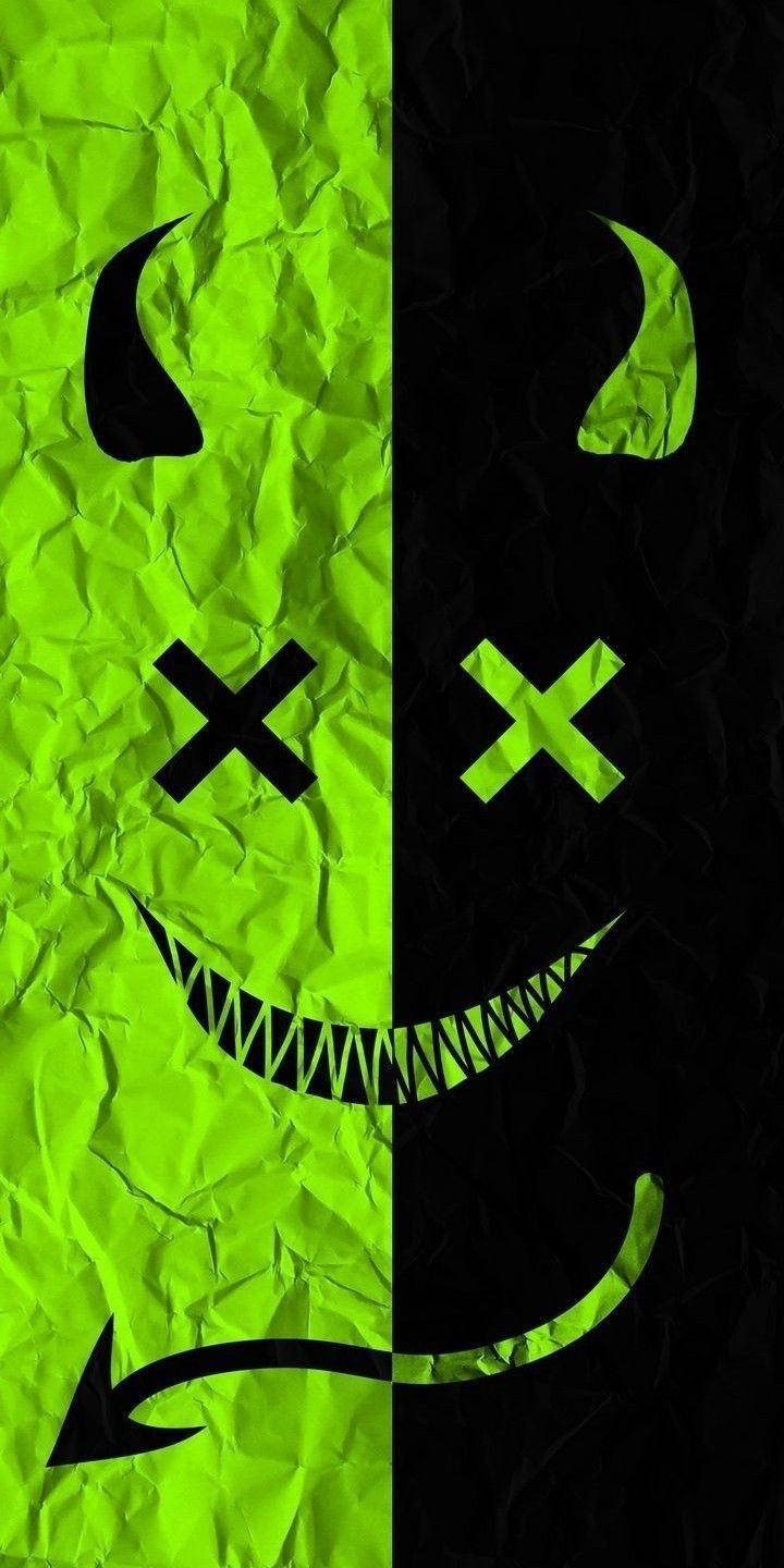 a green and black poster with two faces