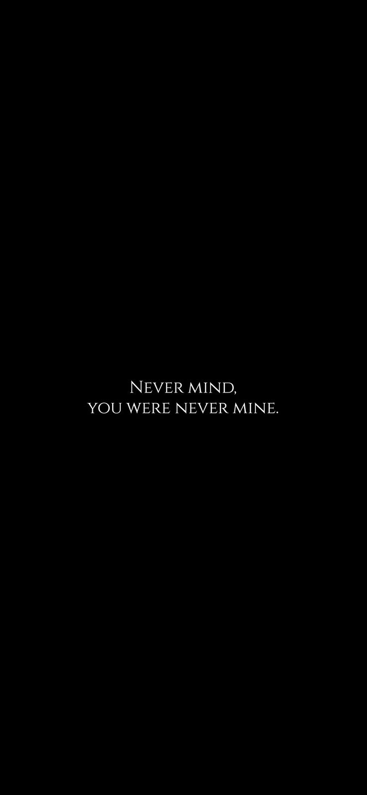 a black background with the words never mind, you were never mine