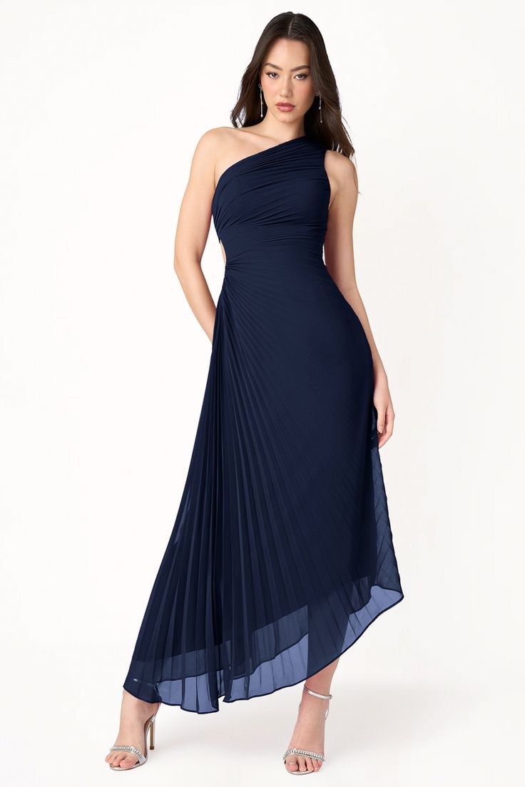 Our Angelina Asymmetrical Dress is the perfect day-to-night style. The sophisticated one-shoulder neckline paired with pleated details and A-line skirt will ensure you stand out at your next formal night out or wedding reception. Pre-draped One Shoulder Dress For Prom, Pre-draped Bridesmaid Dress With Asymmetrical Neckline, One-shoulder Fitted Pleated Evening Dress, One-shoulder Maxi Dress With Ruched Bodice For Evening, One Shoulder Dress With Ruched Bodice For Gala, One Shoulder Dress With Ruched Bodice For Wedding, Formal One-shoulder Evening Dress With Ruched Detail, Asymmetrical Maxi Dress With Ruched Bodice For Gala, Ruched One Shoulder Dress With Asymmetrical Neckline For Gala