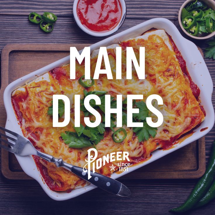 a casserole dish with cheese, sauce and green peppers on the side that says main dishes