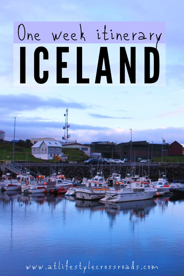 a harbor filled with lots of boats under a blue sky and the words one week itinerary iceland