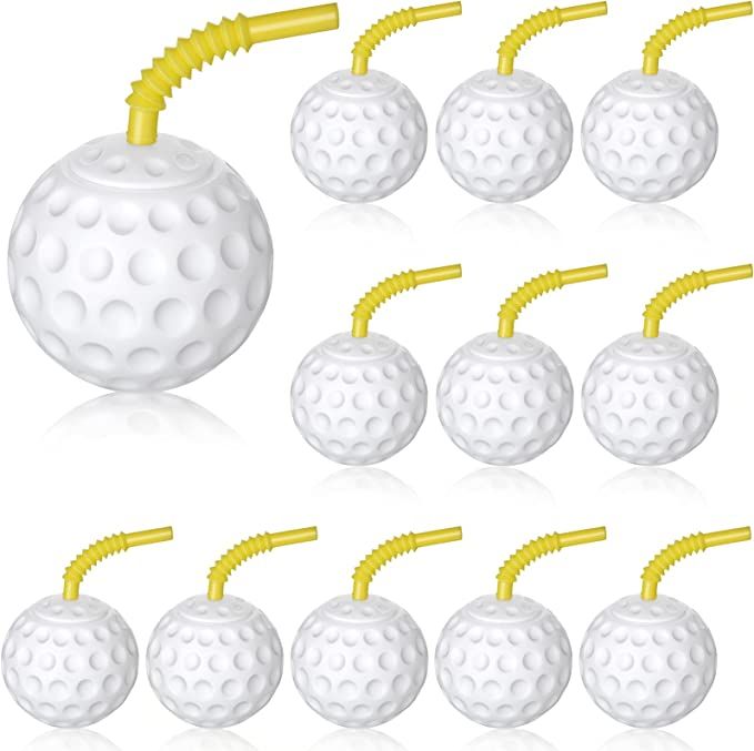 six white golf balls with yellow tees and two yellow handles on each one side