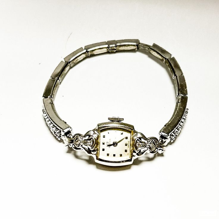 Vintage Omega Ladies 14k Gold and Diamond Watch Spidel Bracelet  Watch is Not Running Classic Diamond Watch With Jubilee Bracelet For Formal Occasions, Classic Formal Diamond Watch With Jubilee Bracelet, Vintage Diamond Gold Bracelet For Formal Occasions, Classic White Gold Diamond Watch With Jubilee Bracelet, Formal Diamond Bracelet Strap Jewelry And Watches, Diamond Bracelet Strap Jewelry And Watches For Formal Occasions, Vintage Diamond Watch With Bracelet Strap For Formal Occasions, Vintage Formal Diamond Watch With Bracelet Strap, Elegant Diamond Watch With Jubilee Bracelet For Formal Occasions