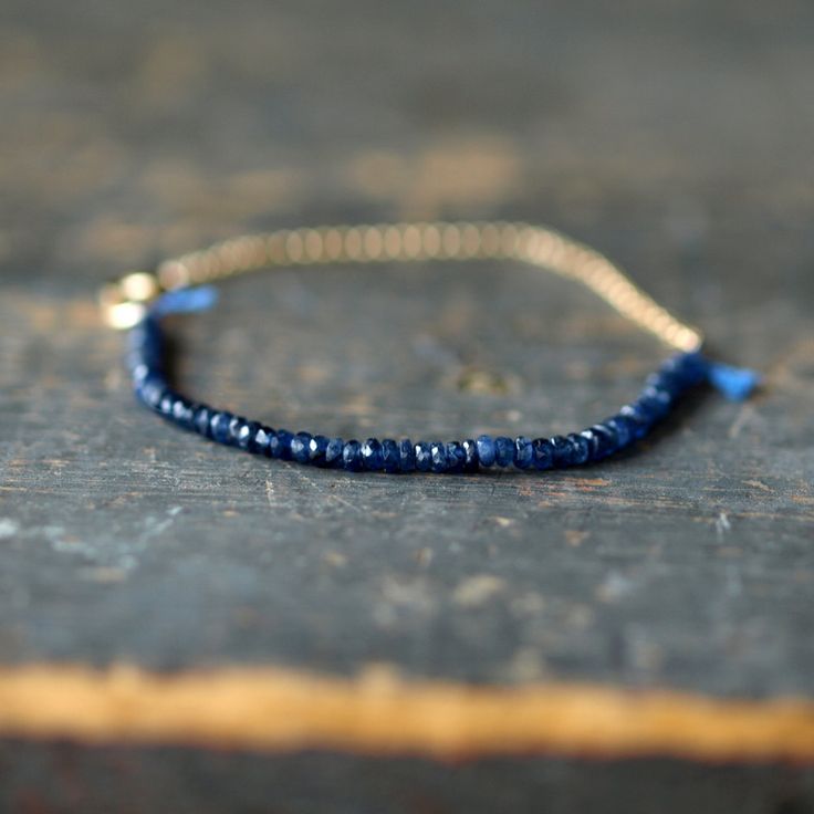 Blue Sapphire Gemstone Bracelet Precious Gem Gold Chain Delicate Handmade Jewelry. $98.00, via Etsy. Blue Beaded 14k Gold-filled Jewelry, Dainty Blue Faceted Beaded Bracelets, Dainty Blue Gemstone Beaded Bracelets, Blue Dainty Gemstone Beaded Bracelet, Faceted Sapphire Beaded Bracelets As Gift, Blue Beaded Jewelry In 14k Gold Filled, Blue 14k Gold Filled Bracelet Jewelry, Blue Gemstone Beads Jewelry In 14k Gold Filled, Blue Gemstone Beads Jewelry In 14k Gold