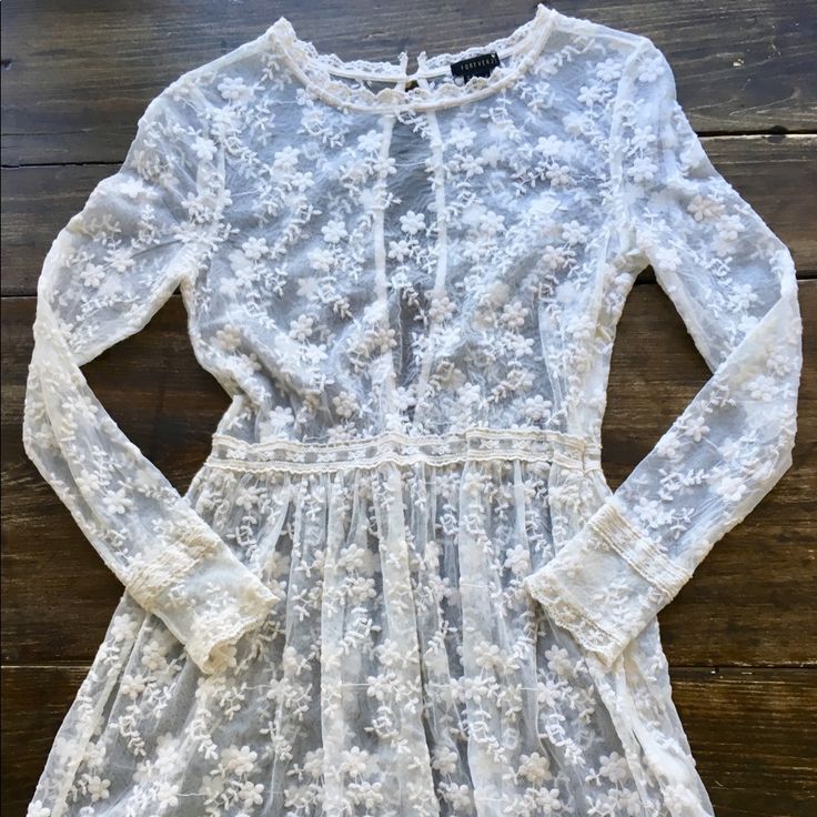 Ivory Lace Long Sleeve Dress Forever 21 Excellent Condition, Never Worn 100%Cotton Not Itchy, High Quality Fabric Hidden Side Zipper For Easy On And Off Shell Buttons Size S, Fits Like Xs Or Sp Please Check Measurements For A Perfect Fit Bust (Armpit To Armpit):16” Sleeve: 22” Length:31” Waist:13.5” Feel Free To Ask Bundle Two Or More For A Discount Thank You For Looking Suggested Seller Forever 21 Long Sleeve Dresses For Spring, White Forever 21 Dress For Brunch, Elegant White Dress By Forever 21, Elegant White Forever 21 Dress, White Forever 21 Mini Dress For Brunch, Forever 21 Fitted Daywear Dress, Spring Mini Dress In Cream With Sheer Detail, Forever 21 White Dress For Date Night, White Forever 21 Dress For Date Night