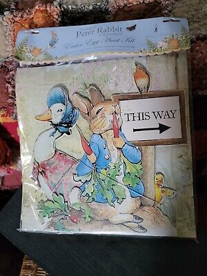 the peter rabbit story book is on display