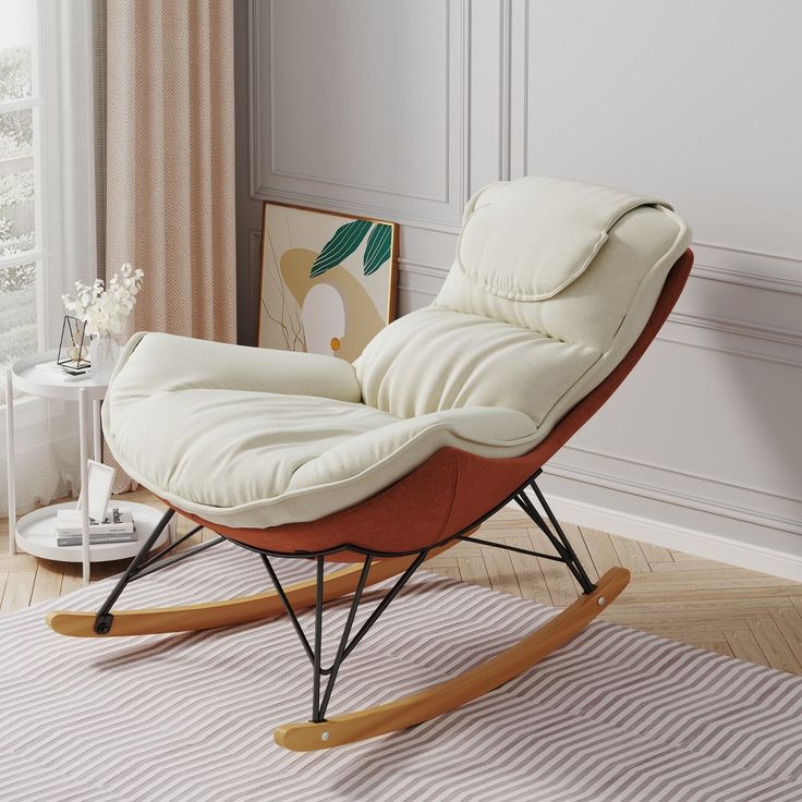 a white rocking chair sitting on top of a wooden floor next to a window with curtains