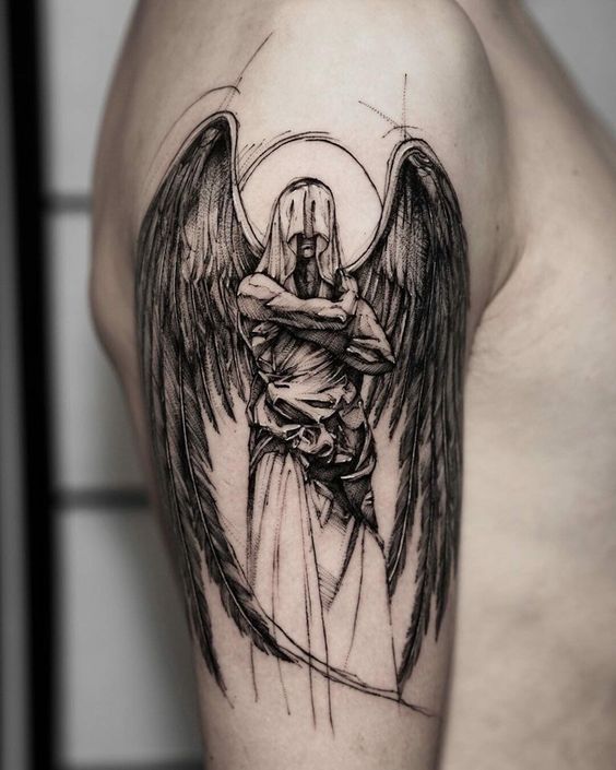 a man with an angel tattoo on his arm