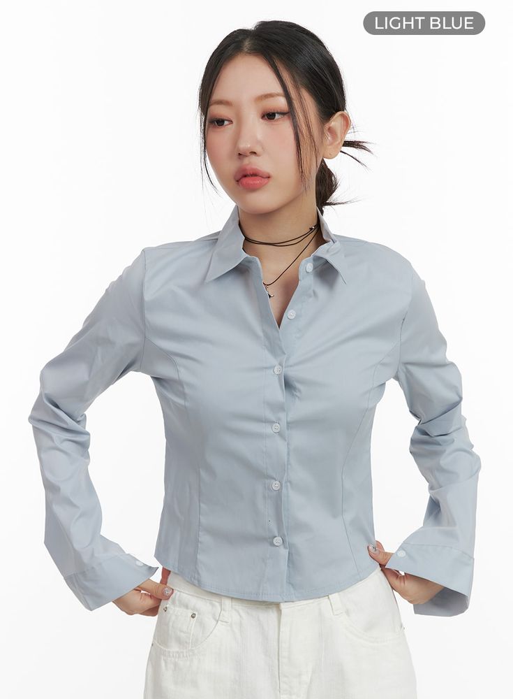 basic-cropped-cotton-buttoned-shirt-oa416 / Light blue Long Sleeve Office Shirt With Back Button Closure, Trendy Fitted Button-up Shirt, Blue Long Sleeve Blouse For Business Casual, Trendy Collared Blouse For Office Wear, Trendy Collared Office Shirt, Solid Shirt For Office Wear In Spring, Light Blue Slim Fit Collared Top, Light Blue Long Sleeve Slim Fit Shirt, Trendy Blouse For Business Casual