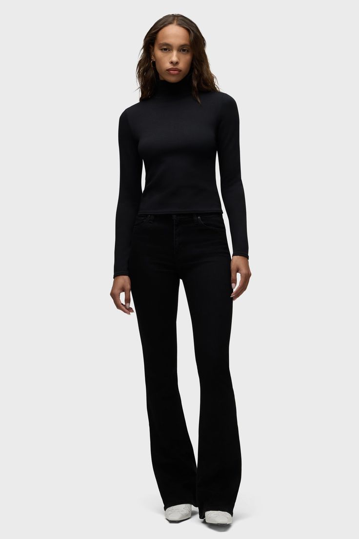 DescriptionStreamlined and flattering, our Barbara High-Rise Bootcut Jean in Black is cut for a slim, contoured fit with an elevated waistline and a gently flared leg. Made from Italian stretch denim designed to smooth, sculp, and hold its shape, it’s the pair your collection is missing.This style is part of our growing range of lower impact fits made with eco-friendly materials, including GOTS-certified organic cotton, GRS-certified recycled elastane, and SCS-certified recycled polyester.Produc High Rise Bootcut Jeans, Bootcut Jean, Jeans Bootcut, Denim Branding, Denim Design, Hudson Jeans, Denim Coat, Denim Shop, Ladies Day