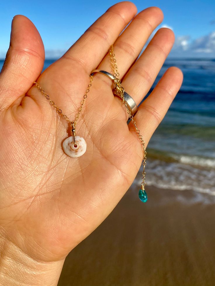 Kauai Puka Shell Necklace - Etsy Dainty Shell Charm Necklace For Beach, Dainty Shell Jewelry For Beach, Dainty Round Jewelry For Beach, Adjustable Dainty Shell Jewelry, Natural Stones Shell Necklace Gift, Dainty White Shell Necklace, White Abalone Shell Necklace For Beach, White Abalone Shell Beach-style Necklace, Gift Shell Necklace With Natural Stones