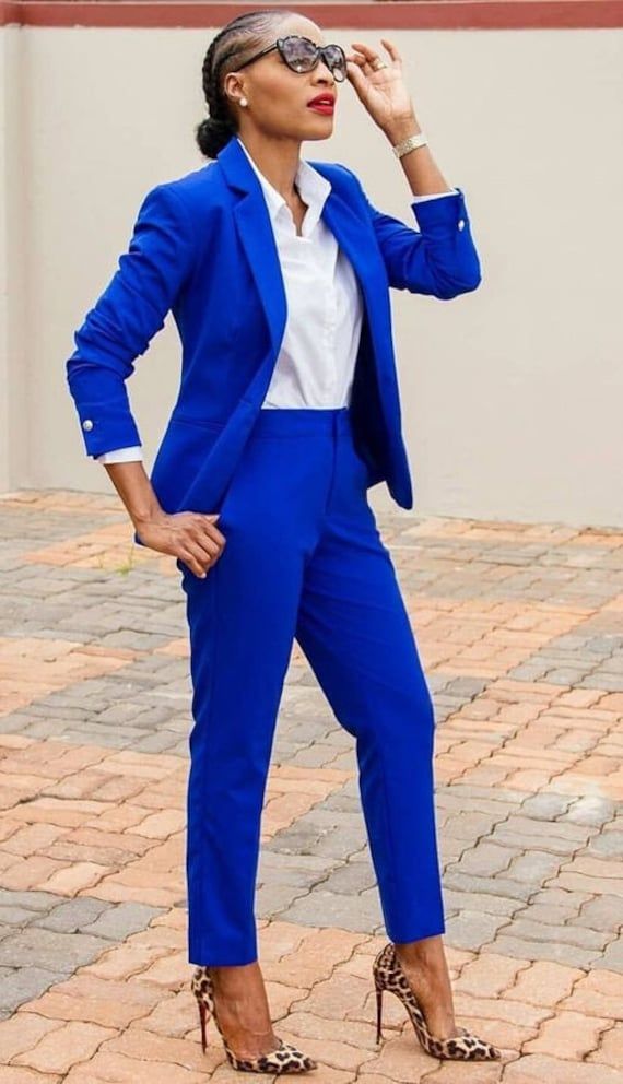 This unique Ladies suit is designed with high quality wool material that guarantees durability and comfort. It is suitable for all kinds of occasion and it can be worn all year round. It comes in 2 pieces (Jacket +  pant), the jacket can also be worn with any pant/jeans. For custom orders, Please feel free to start a  conversation for further enquires. Your satisfaction is our priority  I hope you have a pleasurable shopping experience Royal Blue Pants Suit Women, Royal Blue Pants Work Outfit Women, Tailored Suits With Pockets For Office Wear, Royal Blue Suit Women Outfits, Professional Solid Color Suits For Office Wear, Professional Solid Color Office Suits, Solid Color Winter Suits For Office Wear, Winter Office Wear Classic Suit, Winter Office Wear Suits