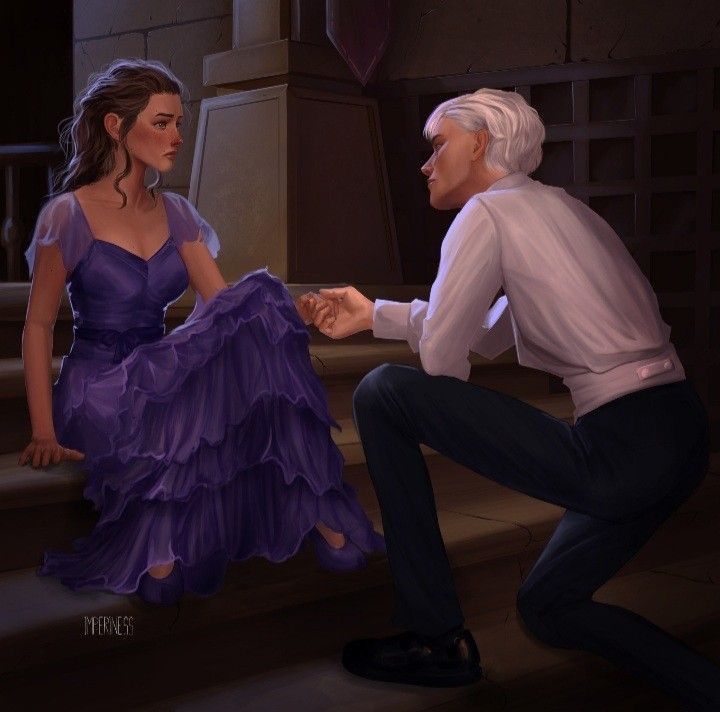 a man kneeling down next to a woman in a purple dress and holding her hand