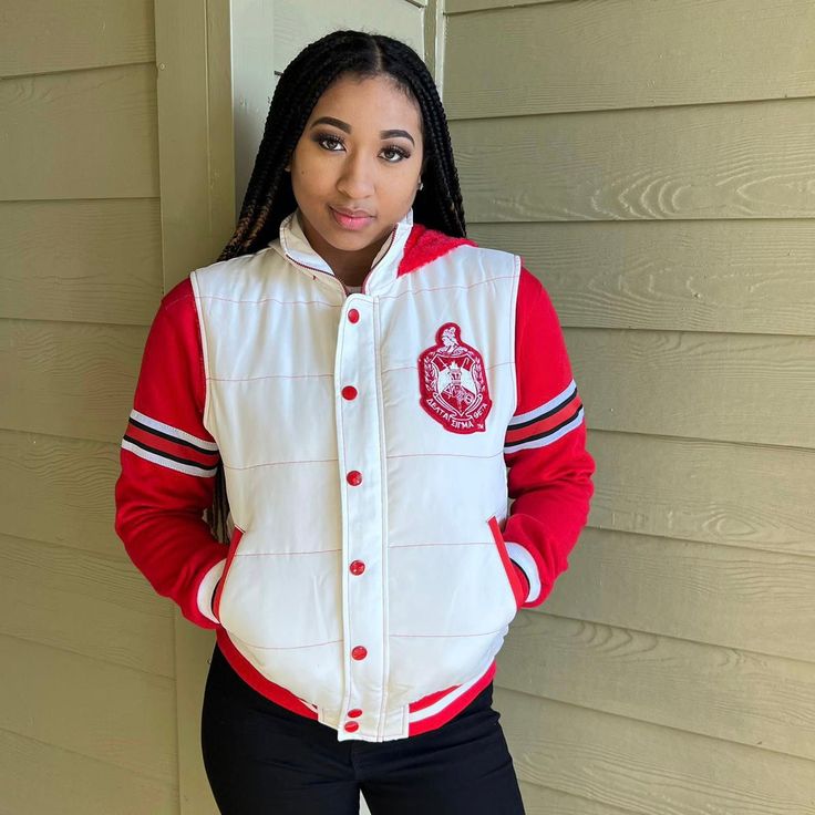 Unisex size order a size down. -White nylon with red stitching -Red ribbing with Sherpa lining -Embroidered Applique Logo hooded Delta Sigma Theta Jean Jacket, Delta Sigma Theta Line Jacket Designs, Delta Sigma Theta Vest, Delta Sigma Theta Long Sleeve Shirts, Hooded Puffer Vest, Red Puffer Vest, Theta Sorority, Delta Sigma Theta Sorority, Diamond Life