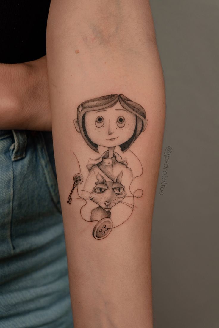 a woman's arm with a drawing of a girl holding a cat on it