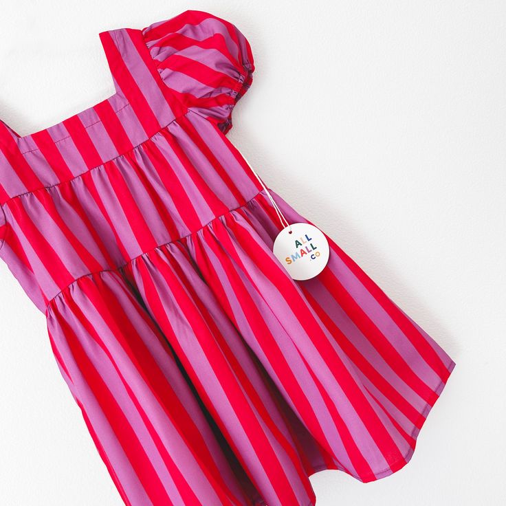 Small will be the star of the show - or should we say circus?! Look absolutely adorable at your next event in our Circus Stripe Dress. Perfect for any season with it's tiered design, puff sleeves, and midi length. No need to clown around when it comes to being a style icon. 100% Cotton. Made in China. *Sizing runs generously size down for a more fitted look. Machine wash cold, tumble dry low. Colorful Baby, Dopamine Dressing, Tier Dress, Clowning Around, Baby Colors, Baby Princess, Kids Style, Stripe Dress, Baby Crafts