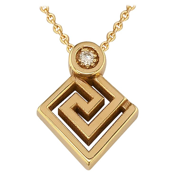 S.Georgios designer pendant necklace is handmade from solid 18 Karat Yellow Gold and carved forming the Greek Key design, which is the symbol of eternity. This stunning pendant necklace features a brilliant-cut White Diamond total weight of 0.02 Carat and is delicately hung from a 16-inch chain, and can be sent at any length chain. We also make this gorgeous pendant necklace in White and Rose Gold, with different stone selections, and at your desired chain length, please contact us. All Georgios Key Pendant Necklace, Greek Jewelry, Key Design, Key Pendant, Greek Key, White Diamond, Chain Length, Diamond White, Or Rose