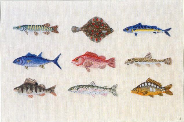 the fish are all different colors and sizes on the white fabric, which has been stitched together