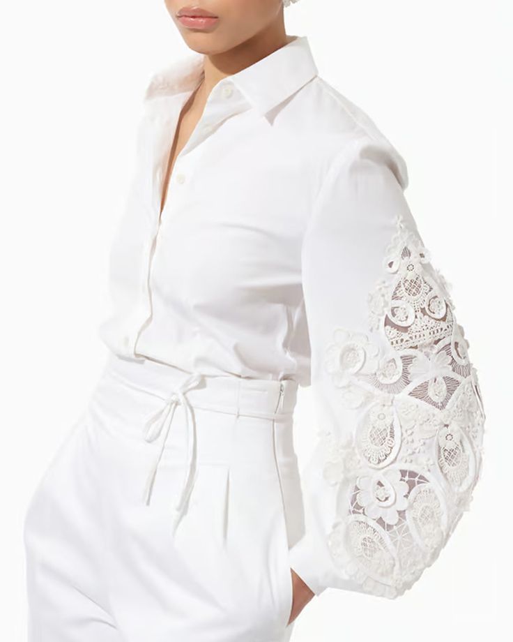 Carolina Herrera White Embroidered Puff Sleeve Blouse Collar Long balloon sleeves; button cuffs Concealed button down front closure Regular fit Embroidered detail 97% cotton, 3% polyurethane Luxury Collared Blouse With Covered Buttons, Luxury Embroidered Tops With Spread Collar, Luxury Embroidered Cotton Blouse, Luxury Embroidered Daywear Shirt, Luxury Lapel Collar Blouse For Summer, Luxury Fitted Blouse With Embroidered Sleeves, Luxury Embellished Button-up Tops, Luxury Feminine Embroidered Blouse, Luxury Short Sleeve Blouse With Lace Collar