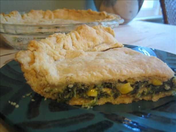 a piece of pie sitting on top of a blue plate