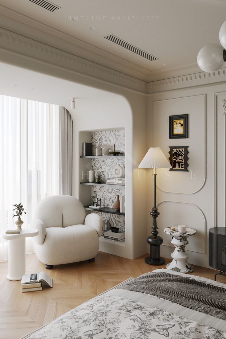 a bedroom with white furniture and wooden floors