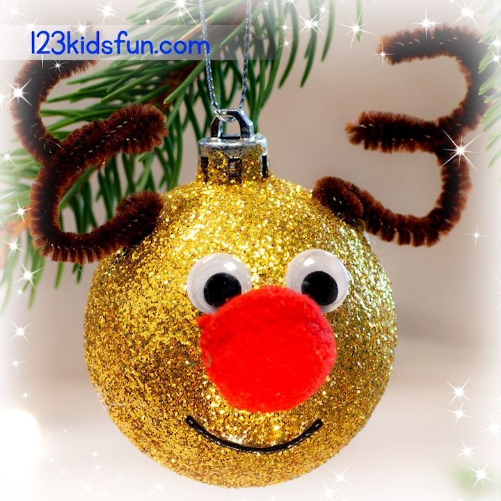 a christmas ornament with a nose and nose painted on it's face