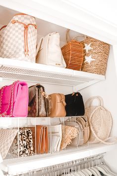 several purses and handbags are on shelves in a closet with white shelving