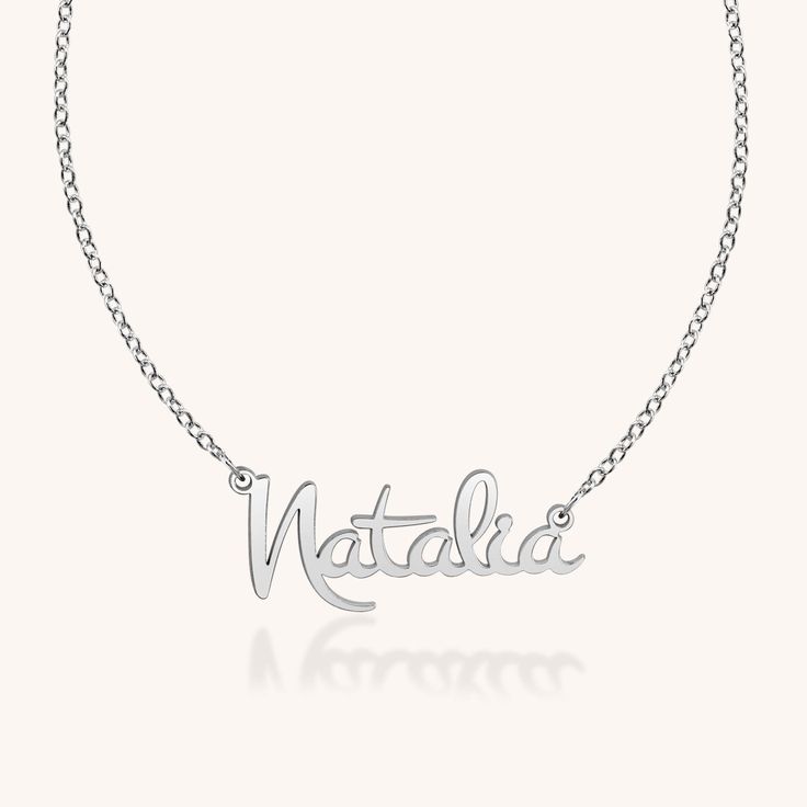 With subtle and graceful personalized script details, the Natalia captures the essence of Everyday Extraordinary in all the right ways. Classic Nameplate Necklace For Wedding, Classic Wedding Nameplate Necklace, Classic White Gold Name Necklace As Gift, Engraved White Gold Custom Nameplate Necklace, Elegant Silver Necklace For Personalized Gift, Signature Engraved Jewelry For Anniversary, Elegant Sterling Silver Nameplate Necklace, Sterling Silver Nameplate Necklace For Wedding, Luxury Sterling Silver Name Necklace For Formal Occasions