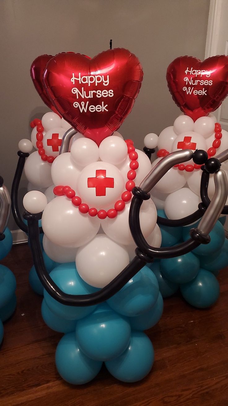 balloons are arranged in the shape of medical symbols and heart - shaped balloons that say happy nurses week