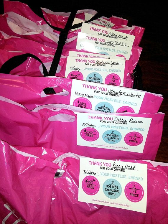 pink bags with thank you notes on them