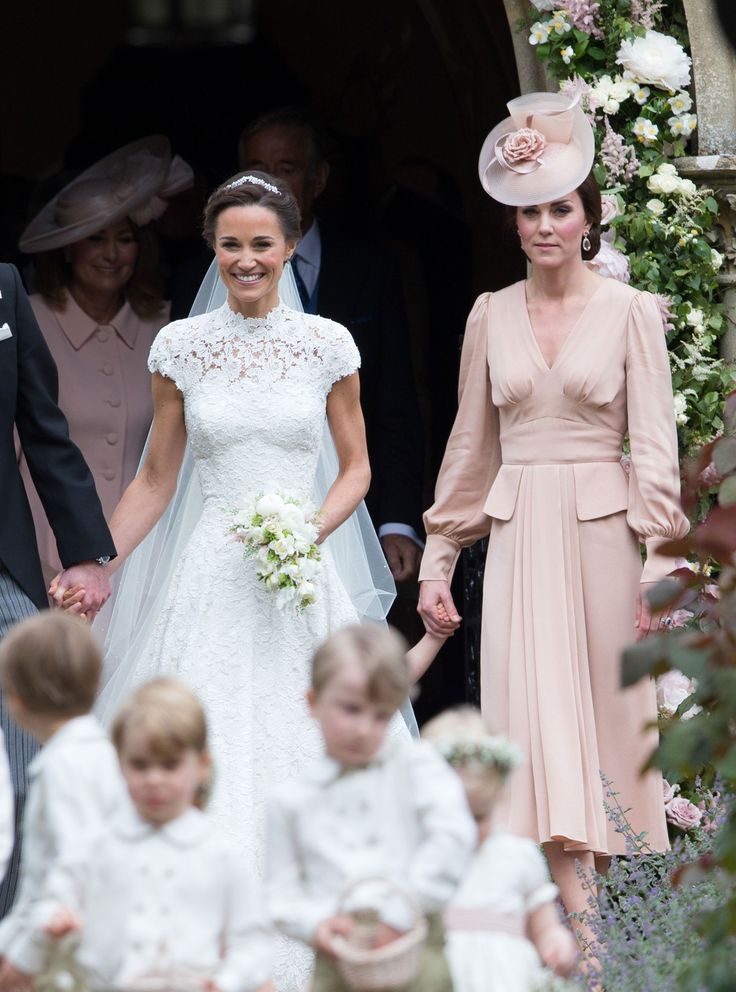 the duke and princess of cambridge walk down the aisle with their children on their wedding day