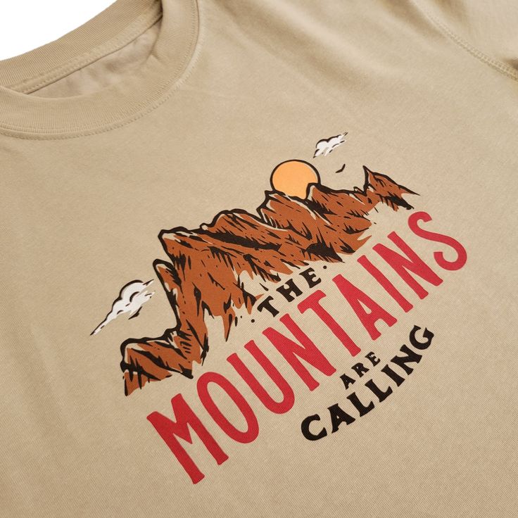 Our Trail Tees look and feel like premium cotton t-shirts, but they also keep you cool, dry, and comfortable. Designed for everyday comfort with performance tech built in. The design on this shirt features The Minarets, a prominent mountain range in the Eastern Sierra, and the famous saying from John Muir "The mountains are calling".- Locally printed in Mammoth Lakes, CA- Tan shirt with a Black, Red, Brown, and White screen printed graphic- UPF 25+ Sun Protection- Quick Dry moisture wicking tech Women T Shirts Graphic Tees, Outdoor Shirt Designs, Mountain Tshirt Design, Outdoor Tshirt, Mountain T Shirt, Mountain Wear, Mountain Graphic Tee, Winter Tees, Mountain Tee