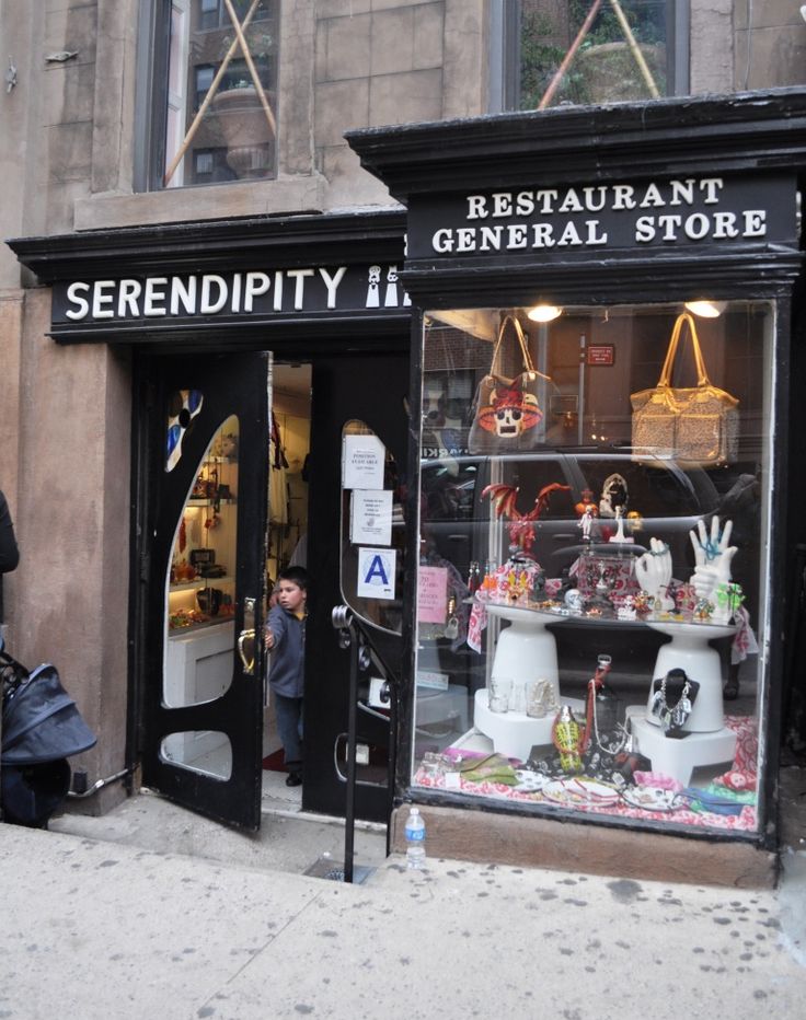 a store front with an assortment of items in the window