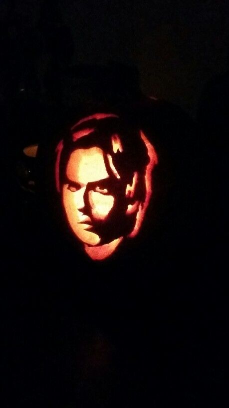 a pumpkin carved to look like the face of john krass from star trek