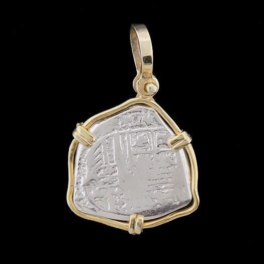 Frame - Solid 14K Gold Double Prong Wrap Dimensions - 3/4" diameter(the pendant is the size of a nickel) Weight - 4.5 grams Now You Can Own a Piece of History! Atocha Silver is More Pure than Sterling Silver! The silver coin was hand cast using a formulated blend of silver ingots recovered from the Sunken Treasure of the Nuestra Senora de Atocha and fine Sterling Silver. The Nuestra Senora de Atocha (Our Lady of Atocha) Spanish Galleon shipwrecked on September 5, 1622, when it struck a reef duri Collectible Round Coin Pendant Jewelry, Antique Yellow Gold Jewelry With Hammered Details, Antique Hammered Yellow Gold Jewelry, Antique Yellow Gold Jewelry With Coin Pendant, Gold Large Pendant Jewelry For Commemoration, Commemorative Gold Jewelry With Large Pendant, Heirloom Coin Pendant Collectible Jewelry, 14k Gold Amulet Jewelry With Coin Pendant, 14k Gold Coin Jewelry For Commemoration