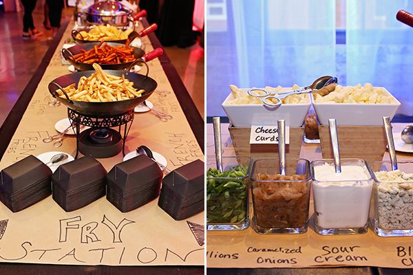 there are many different types of food on the buffet table at this party, including popcorn and salads