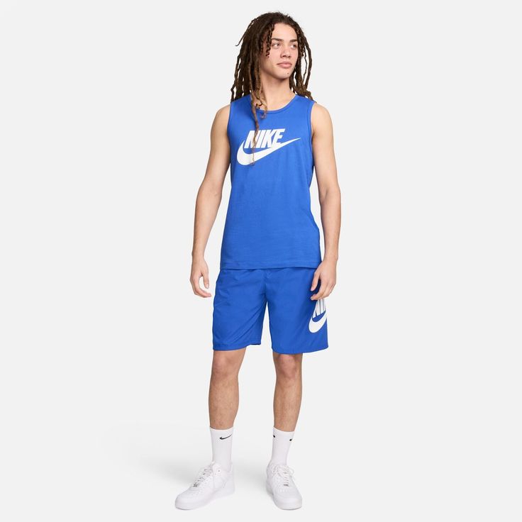 Live comfortably in the Nike Sportswear Futura Logo Tank. This relaxed Nike print tank features a soft cotton jersey feel and bold branding at the chest for warm-weather comfort and style. Standard fit for a relaxed, easy feel. Fabric: 100% cotton. Machine wash. Imported. Crew Neck Cotton Tank Top For Sports, Casual Muscle Tee For Gym In Summer, Casual Summer Muscle Tee For Gym, Casual Sleeveless Tank Top For Sports Season, Casual Cotton Muscle Tee With Moisture-wicking, Casual Cotton Muscle Tee For Workout, Casual Summer Gym Tank Top, Casual Cotton Tank Activewear, Relaxed Fit Cotton Tank Top Athleisure